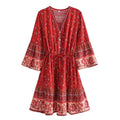 Vestido Curto com Mangas Sino